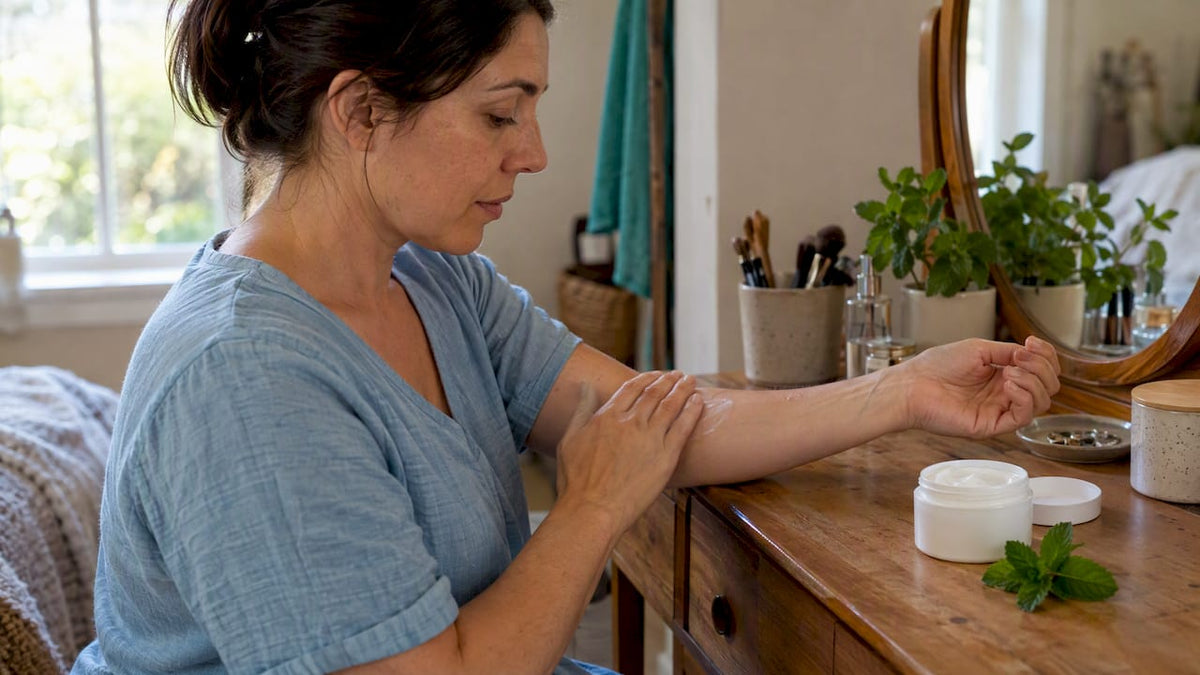 Woman applying magnesium lotion to her forearm